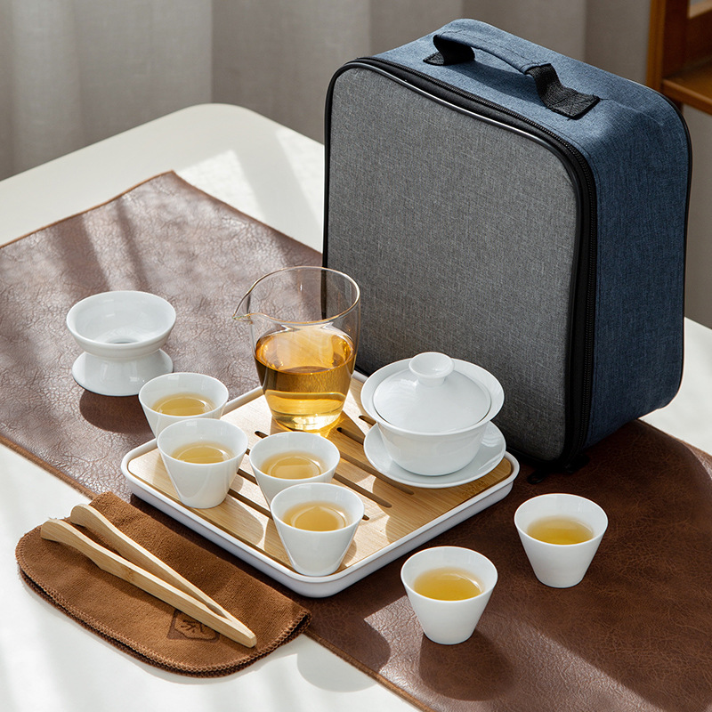 Белый фарфоровый туристический чайный сервиз Dehua крышка чашка будет носить чайную тарелку logo открытие бизнес - дом прямая трансляция оптовая - Высокий белый фарфор - чашка с крышкой - шесть чашек - с чайной тарелкой - дорожная сумка