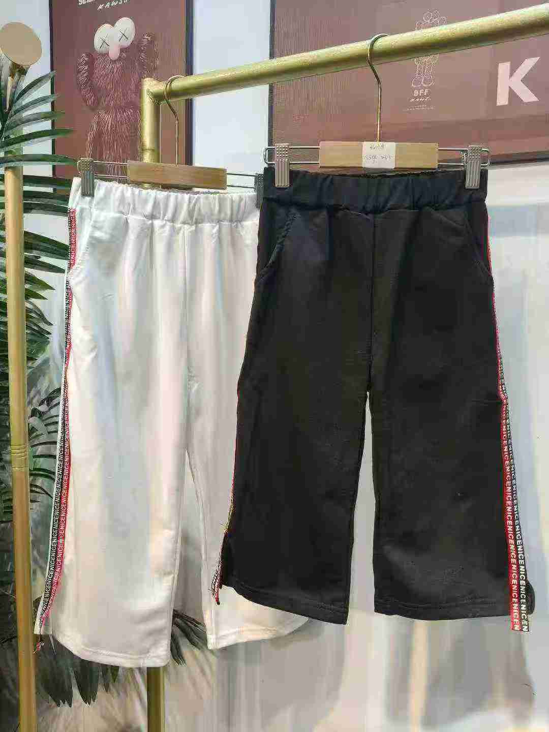 Полная очистка 4,8 133 летних детских костюмов для отдыха семь минут хлопчатобумажных средних брюк из чешуи ткани, один двухцветный, код 2 - 3 - 4 (120 - 140) самостоятельная упаковка.